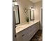 Bathroom features a double vanity with black fixtures, quartz counters, and updated lighting at 2656 Lee Lawing Rd, Lincolnton, NC 28092