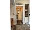 Stylish hallway with hardwood floors, decorative shelves, and modern lighting at 2656 Lee Lawing Rd, Lincolnton, NC 28092