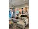 Open-concept living room seamlessly flows into a modern kitchen with an island and stainless steel appliances at 2656 Lee Lawing Rd, Lincolnton, NC 28092