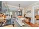 Stylish kitchen with green cabinetry, stainless appliances, and center island at 2909 Park Rd, Charlotte, NC 28209