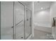 Bathroom with glass enclosed shower and separate soaking tub at 2959 Bellasera Way, Matthews, NC 28105