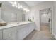 Bathroom featuring double sink vanity and a large mirror at 2959 Bellasera Way, Matthews, NC 28105