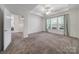 Large bedroom with neutral carpet flooring and lots of natural light at 2959 Bellasera Way, Matthews, NC 28105