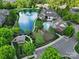 Picturesque community showcasing a pond with fountain, pool, gazebo, walking paths, and lush landscaping at 2959 Bellasera Way, Matthews, NC 28105
