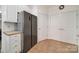 Bright kitchen featuring stainless steel refrigerator and white cabinets at 2959 Bellasera Way, Matthews, NC 28105