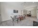 Bright living room with carpet, and an open view of the dining space at 2959 Bellasera Way, Matthews, NC 28105