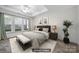 This virtually staged main bedroom features a king bed and decorative accents at 2959 Bellasera Way, Matthews, NC 28105