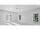 Bright bedroom with french doors and large windows, offering ample natural light at 3677 Antioch Church Rd, Matthews, NC 28104
