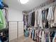 Organized walk-in closet with ample shelving, drawers, and hanging space at 3677 Antioch Church Rd, Matthews, NC 28104