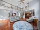 Spacious living area with hardwood floors, high ceilings, and an open layout at 3677 Antioch Church Rd, Matthews, NC 28104
