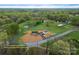 An aerial perspective outlines approximate property lines around a charming home with a detached garage at 391 Springs East Rd, Lincolnton, NC 28092