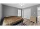 Bedroom featuring hardwood floors, closet, window, and bed at 391 Springs East Rd, Lincolnton, NC 28092