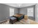 Bedroom with hardwood floors, ceiling fan, window, and furnishings at 391 Springs East Rd, Lincolnton, NC 28092