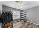 Bedroom with hardwood floors, closet, window, and ceiling fan at 391 Springs East Rd, Lincolnton, NC 28092