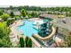 Community pool featuring a water slide, splash pad and a building with a covered picnic area at 4032 Wild Turkey Ln, Indian Land, SC 29707