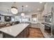 Modern kitchen features a large island, stainless steel appliances, and open layout at 4032 Wild Turkey Ln, Indian Land, SC 29707