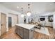 Spacious kitchen features a center island and is adjacent to the dining and living areas at 4032 Wild Turkey Ln, Indian Land, SC 29707