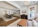Spacious open-concept living and dining area with hardwood floors and large windows at 4032 Wild Turkey Ln, Indian Land, SC 29707