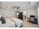 Main bedroom featuring a ceiling fan, recessed lighting, dresser, desk, chair, and entry into the main bathroom at 4032 Wild Turkey Ln, Indian Land, SC 29707