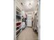Well-organized walk-in closet featuring custom shelves and storage space for clothes, shoes, and accessories at 4032 Wild Turkey Ln, Indian Land, SC 29707
