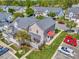 Beautiful aerial view of townhomes featuring lush green lawns, mature trees, and convenient parking at 4133 Carl Parmer Dr, Harrisburg, NC 28075