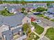 An aerial perspective showcases the residential layout and ample parking spaces within a townhome community at 4133 Carl Parmer Dr, Harrisburg, NC 28075