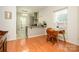 Cozy breakfast nook and modern kitchen featuring stainless steel appliances, granite countertops, and ample natural light at 4133 Carl Parmer Dr, Harrisburg, NC 28075