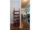 Entryway hallway with hardwood floors leading to the kitchen area at 4205 Green Park Ct, Harrisburg, NC 28075