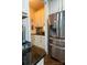 Modern kitchen featuring stainless steel appliances and ample cabinet space at 4205 Green Park Ct, Harrisburg, NC 28075