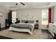 Spacious main bedroom with large windows, ceiling fan, and a plush rug at 4205 Green Park Ct, Harrisburg, NC 28075