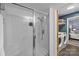 Bathroom with shower, grab bars, and washer/dryer hookups near the bedroom at 4754 Hedgemore Dr # O, Charlotte, NC 28209