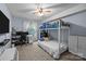 A functional bedroom is furnished with a bunk bed, desk, and shelving at 4754 Hedgemore Dr # O, Charlotte, NC 28209