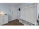 A welcoming entryway featuring a coat rack and shoe storage adjacent to the front door at 4754 Hedgemore Dr # O, Charlotte, NC 28209