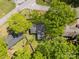 Aerial view of a home, surrounded by lush trees and a well-maintained yard at 510 N Jackson Rd, Lancaster, SC 29720