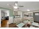 Eat-in kitchen featuring lots of cabinets, a ceiling fan, and a large dining table for gatherings at 510 N Jackson Rd, Lancaster, SC 29720