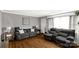 Comfortable living room featuring hardwood floors, neutral paint, and cozy seating arrangements at 510 N Jackson Rd, Lancaster, SC 29720