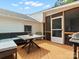 Deck area with outdoor seating and screened-in porch access at 512 Secrest Ave, Belmont, NC 28012