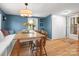 Blue Dining Room with hardwood floors, natural light, and a table for four at 512 Secrest Ave, Belmont, NC 28012