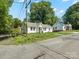 Charming single-story home with white siding, well-maintained lawn and long driveway at 512 Secrest Ave, Belmont, NC 28012