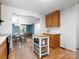 Kitchen features wooden cabinets, stainless steel appliances and a mobile island at 512 Secrest Ave, Belmont, NC 28012