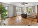 Inviting living room with hardwood floors, neutral decor, and abundant natural light at 512 Secrest Ave, Belmont, NC 28012
