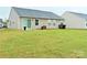 Expansive backyard with lush green grass, offering plenty of space for outdoor activities at 531 Cherry Blossom Nw Ave, Concord, NC 28027