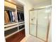 Spacious walk-in closet featuring custom shelving, drawers, and organized hanging space at 531 Cherry Blossom Nw Ave, Concord, NC 28027
