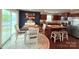 Open dining area features stylish furnishings, adjacent to the kitchen with stainless steel appliances and granite countertops at 531 Cherry Blossom Nw Ave, Concord, NC 28027
