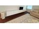 Bright living room featuring modern floating media console and comfortable seating at 531 Cherry Blossom Nw Ave, Concord, NC 28027