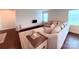 Cozy living room featuring plush seating and sleek media console at 531 Cherry Blossom Nw Ave, Concord, NC 28027