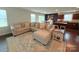 Open concept living room with a large comfortable sectional couch at 531 Cherry Blossom Nw Ave, Concord, NC 28027