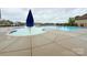 Large community pool with various depths and surrounding residential neighborhood at 531 Cherry Blossom Nw Ave, Concord, NC 28027