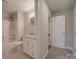 Bathroom featuring a granite vanity and a shower over tub combo at 5604 Unionville Rd, Monroe, NC 28110