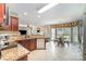 Open kitchen layout with stainless steel appliances, granite countertops, and a breakfast nook at 591 Highland Ridge Rd, Mooresville, NC 28115